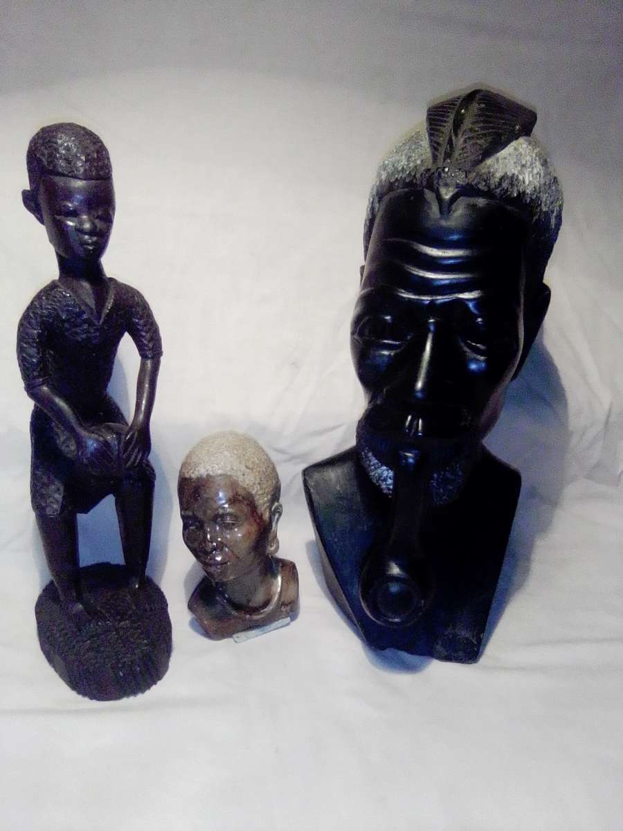 A Mandela and Keyna Busts. African Tribal Head Man stone Bust.  + wooden Drum player statue.