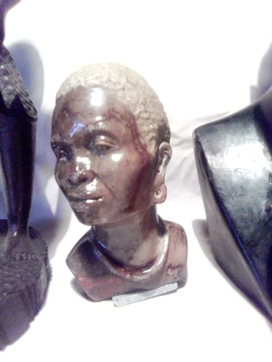 A Mandela and Keyna Busts. African Tribal Head Man stone Bust.  + wooden Drum player statue.