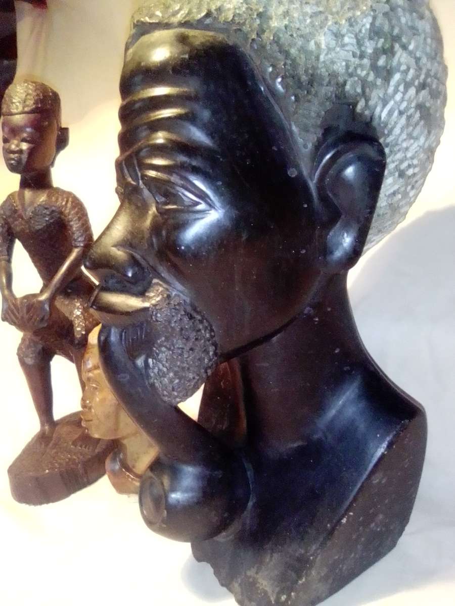 A Mandela and Keyna Busts. African Tribal Head Man stone Bust.  + wooden Drum player statue.