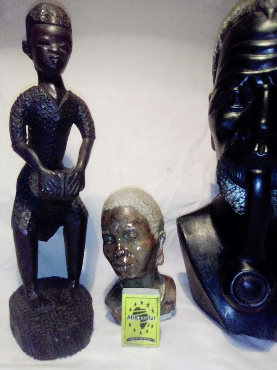 A Mandela and Keyna Busts. African Tribal Head Man stone Bust.  + wooden Drum player statue.