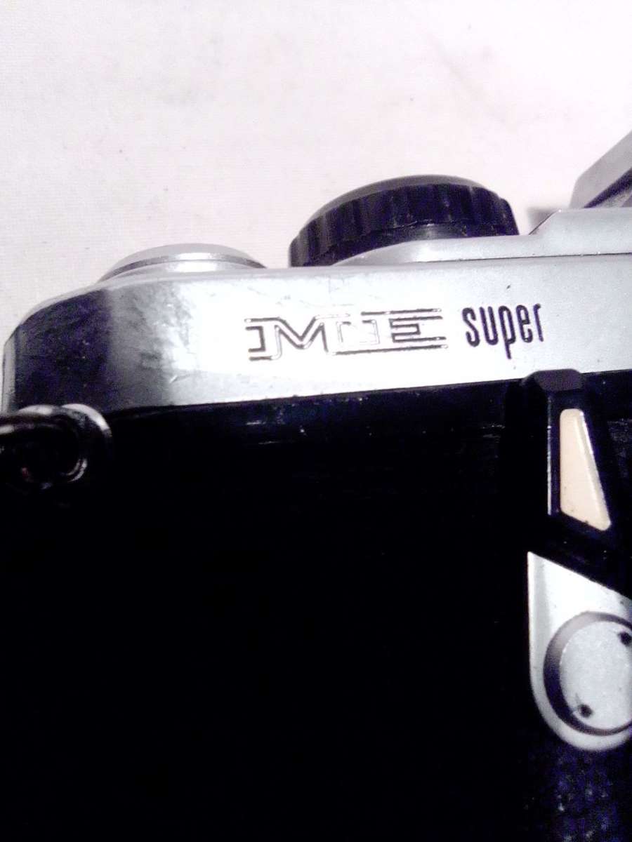 A Vintage 35mm Pentax ME super Camera in case and bag. It came from an Estate Auction.