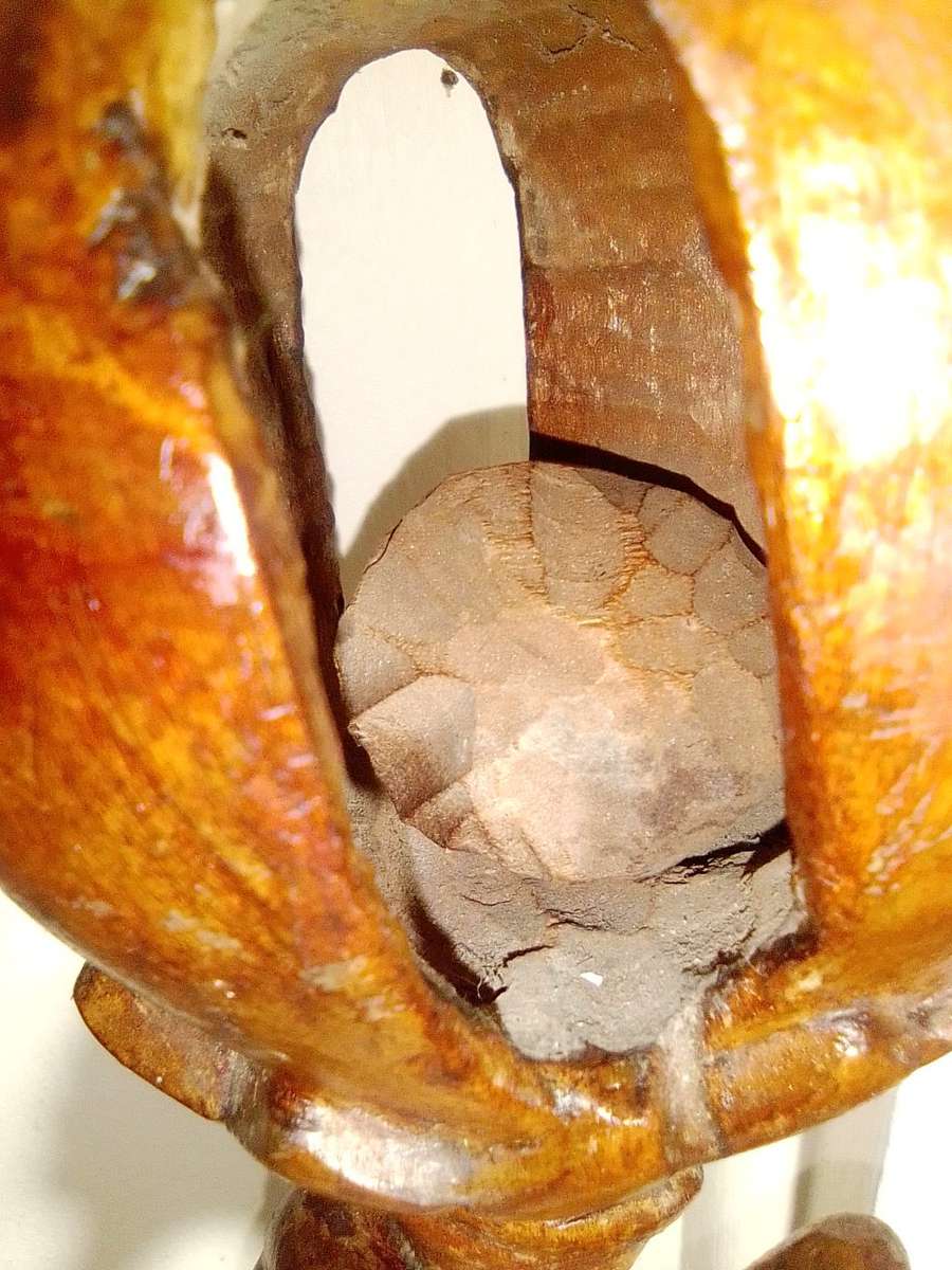 The Nyaminyami is described as having the body of a snake the head of a fish. Ethnic Walking Stick.