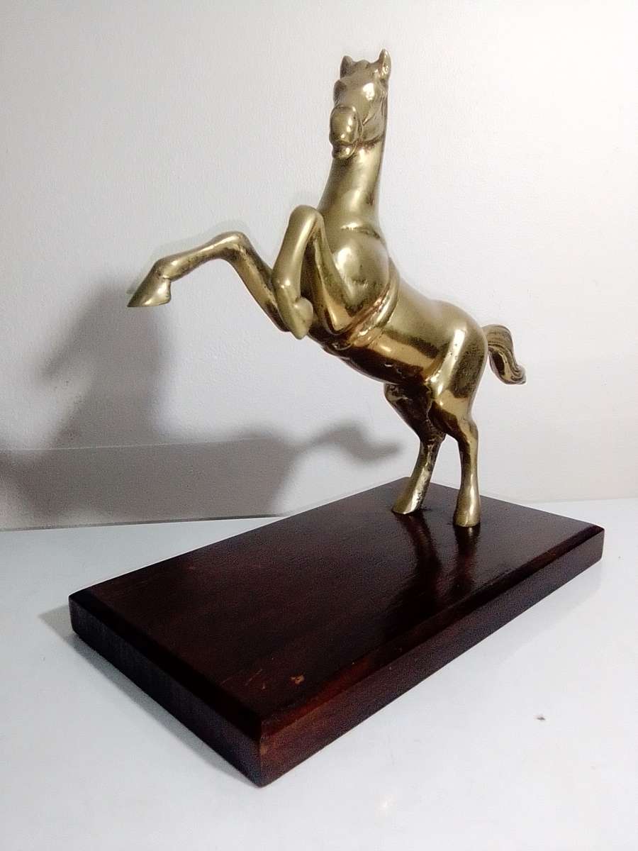 A Old very heavy 2.6Kg Brass Stallion rearing up on wood stand. A Impressive solid Brass horse.