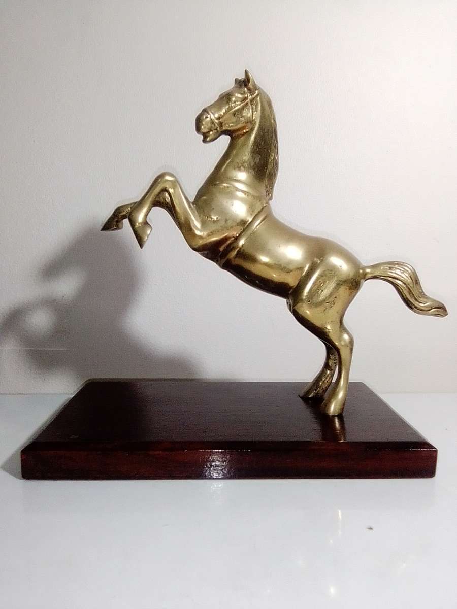 A Old very heavy 2.6Kg Brass Stallion rearing up on wood stand. A Impressive solid Brass horse.