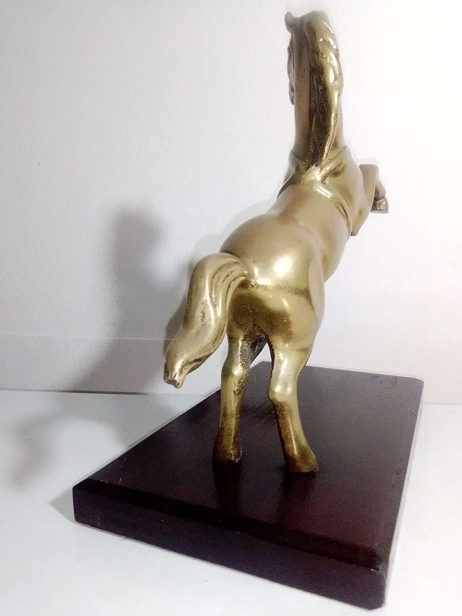 A Old very heavy 2.6Kg Brass Stallion rearing up on wood stand. A Impressive solid Brass horse.
