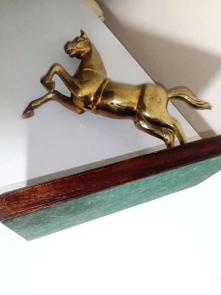 A Old very heavy 2.6Kg Brass Stallion rearing up on wood stand. A Impressive solid Brass horse.