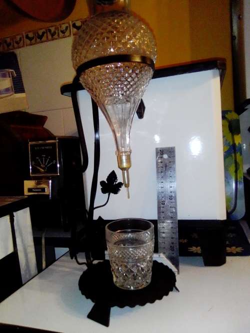 Vintage Mid Century Cut glass Aerator Wine Decanter on wrought Iron Ivy stand.