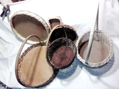 Job lot of 7 hand woven Rotan Vintage baskets The tallest 480mm x 385mm wide.