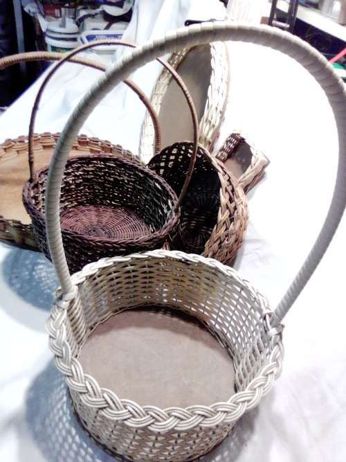 Job lot of 7 hand woven Rotan Vintage baskets The tallest 480mm x 385mm wide.