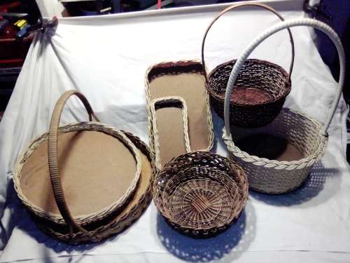 Job lot of 7 hand woven Rotan Vintage baskets The tallest 480mm x 385mm wide.