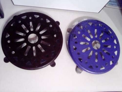 Three old Kitchen Trivets.Two enamel blue plus White and the other brown metal.In good condition.
