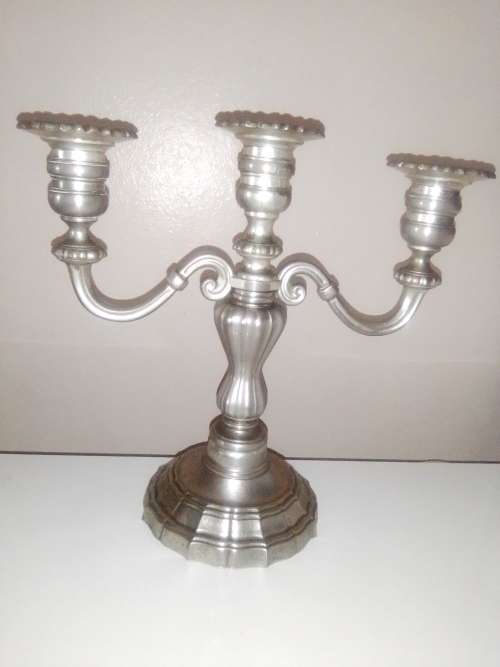 A Heavy very old Three arm Candelabra. Made by EM-ESS in good condition for it`s age.
