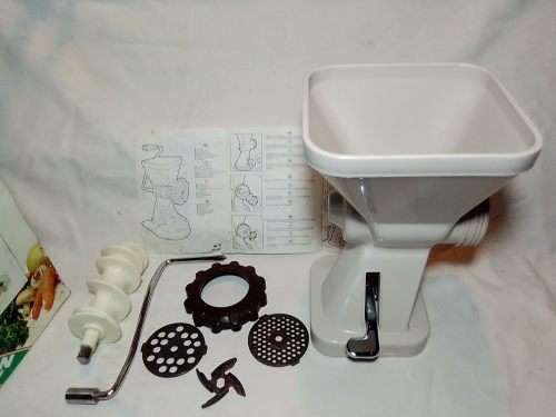 In Good working order. Original box. Prestage Mincer made in ITALY. hand driven, table suction.