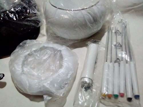 Brand New and clean. An Estate find, a German, Complete and boxed white enamel Fondue.