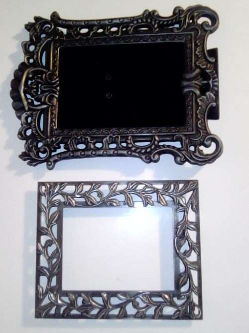 2 Beautiful metal picture frames, No Glass one Pewter is 19cm x 15cm and the other is 14cm x 12cm.