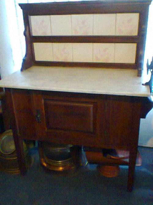 A Beutiful Teak Washtable with White Marble top  We will Deliver to JHB R500& PTA for R650.