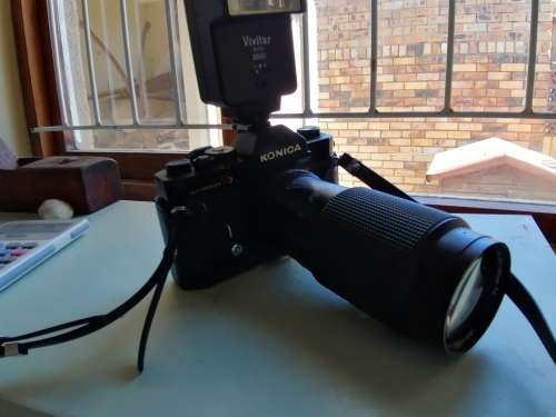 Vintage Konica Autoreflex T3 camera with extra Flash and Lens