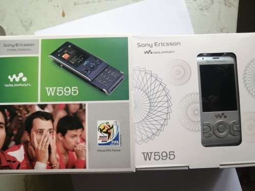 Vintage Sony Ericsson cellphone with Charger - W595