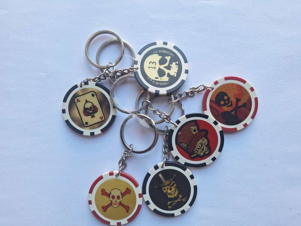 Various skeleton keyring holders like heavy poker chips
