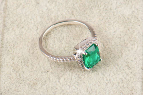 The 2.50 Ct. S925 Sterling Silver Emerald Green Cut Engagement Ring