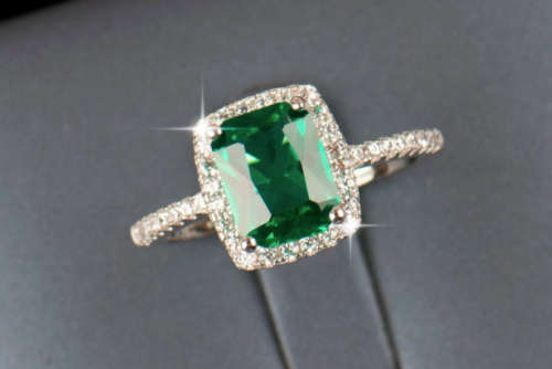 The 2.50 Ct. S925 Sterling Silver Emerald Green Cut Engagement Ring