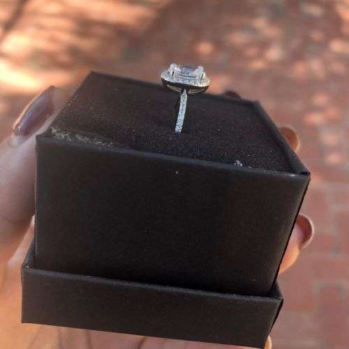 The S925 Sterling Silver 1.25 Ct. Clear Oval Cut Halo Engagement Ring