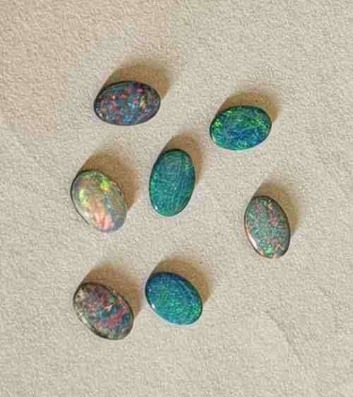 Natural Mined Oval Australian Opal doublet  6 - 6.5 x 4 - 4.5 mm & 0.30cts