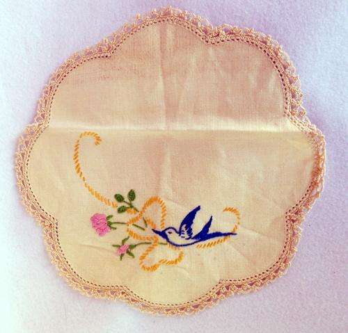 Small round cloth with crochet edging