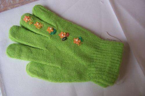 Beautiful knitted gloves!  Very pretty with flower sequens