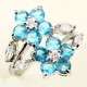 18K WHITE GOLD DOUBLE FLOWER BLUE TOPAZ RING