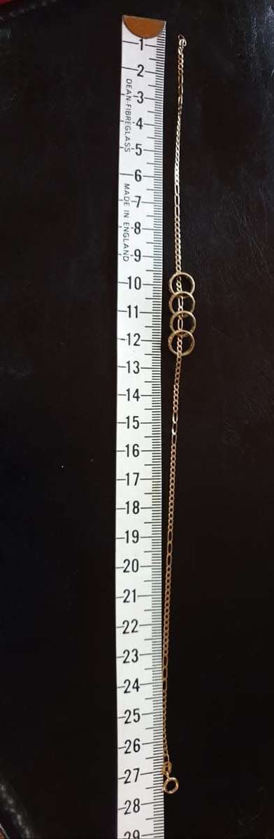 Genuine  Fine 9ct Gold Figaro Ankle Bracelet with 4 lace like pattern rings