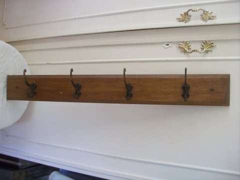 COAT RACK . WOOD.  4 HOOKS.