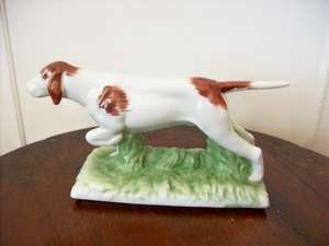 ORNAMENT OF A POINTER DOG. PORCELAIN/CERAMIC