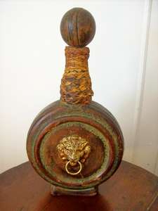 A LEATHER COVERED FLAT DECANTER / BOTTLE