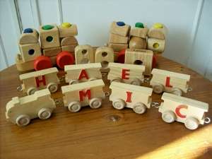 A CHILDS WOODEN TRAINSET AND BLOCKS