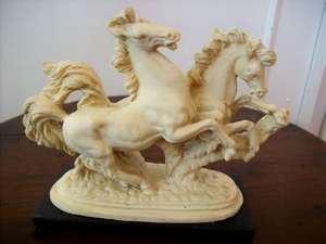 A BEAUTIFUL ORNAMENT OF A PAIR OF HORSES