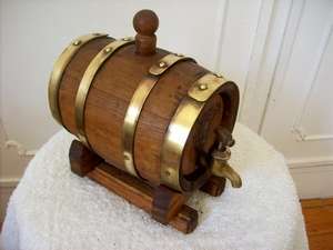OAK WINE BARREL WITH BRASS STRAPS & TAP.