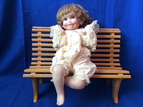 Vintage Porcelain Doll - Girl on a Bench