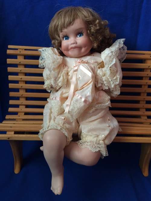 Vintage Porcelain Doll - Girl on a Bench