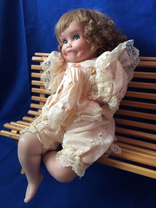 Vintage Porcelain Doll - Girl on a Bench