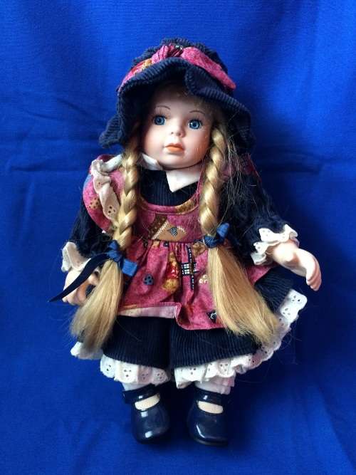 Vintage Porcelain Doll - Girl at a Desk