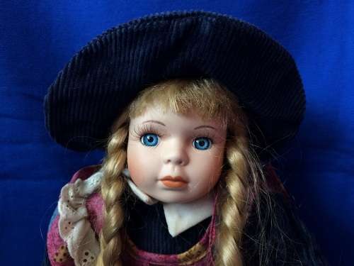 Vintage Porcelain Doll - Girl at a Desk