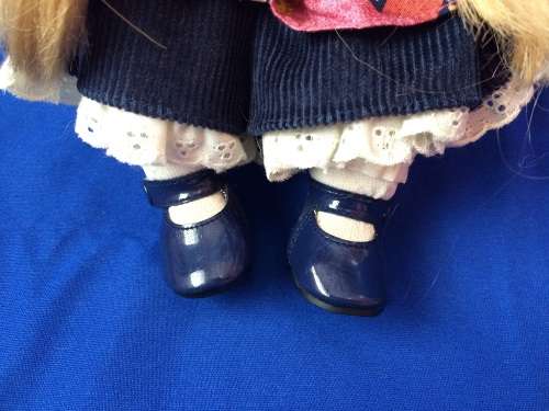 Vintage Porcelain Doll - Girl at a Desk