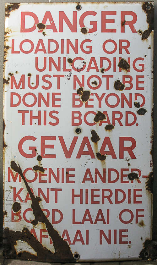 VINTAGE REUSABLE ENAMEL SIGN DANGER LOADING OR UNLOADING