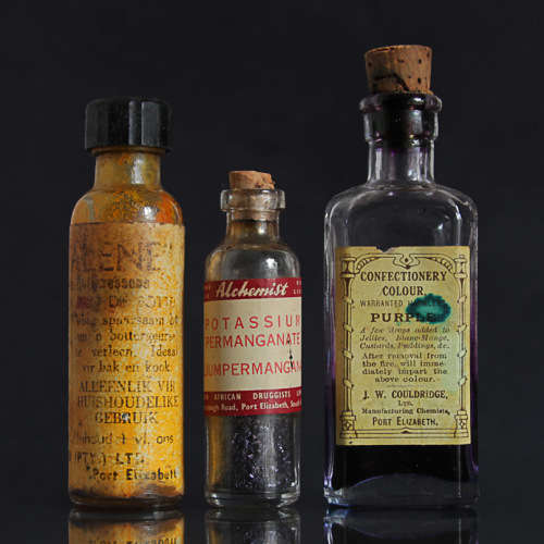 1 LOT OF 4. VINTAGE CHEMIST/ALCHEMIST/CONFECTIONERY BOTTLES AND ENVELOPE WITH CONTENTS
