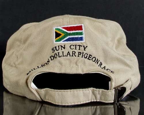 VINTAGE SUN CITY MILLION DOLLAR PIGEON RACE WORLD FREE FLIGHT PEAK CAP