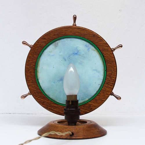 UNUSUAL LIGHT OF A SHIP WHEEL CONTAINING AN AQUARIUM - OAK, BRASS, PERSPEX - 1970's