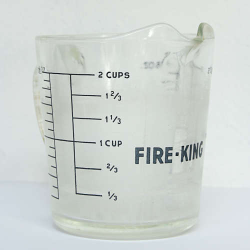 TWO VINTAGE FIRE-KING 2 CUP JUGS, 1 LOT