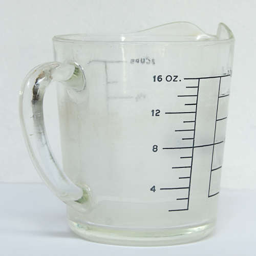 TWO VINTAGE FIRE-KING 2 CUP JUGS, 1 LOT