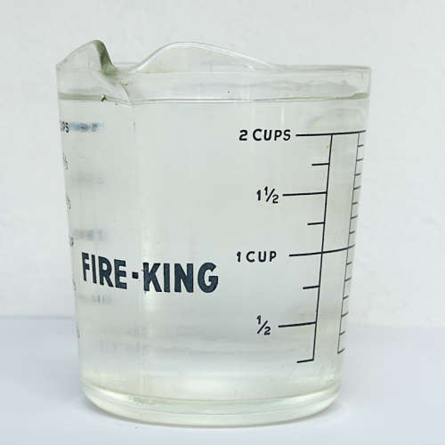 TWO VINTAGE FIRE-KING 2 CUP JUGS, 1 LOT